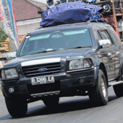 main-mudik-mobil-bagasi-atas-asuransi